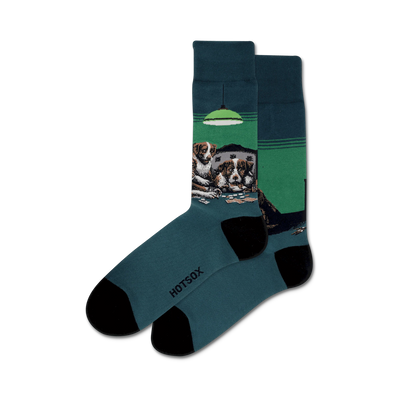 A pair of teal crew socks featuring a design of dogs playing poker around a green felt table under a green lamp. Black toe and heel.