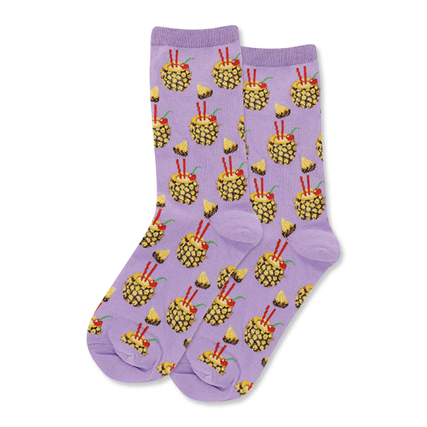 Pair of crew socks with a soft lavender background, patterned with yellow pineapple drinks, red straws, cherries, and pineapple slices. }}