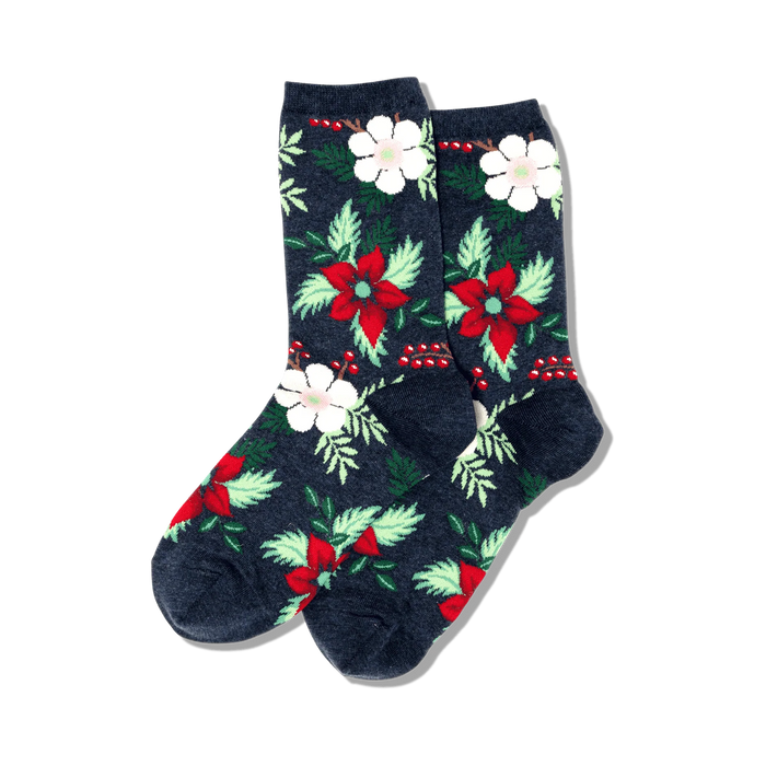 A pair of women's crew socks in navy blue, adorned with a festive pattern of red poinsettias, white flowers, and green leaves. }}