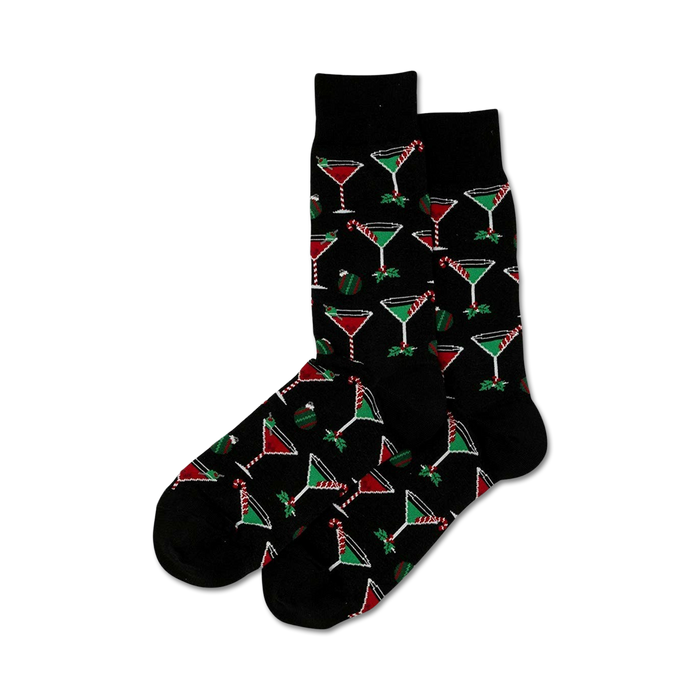 Pair of black crew socks with a repeating pattern of red and green martini glasses, candy canes, and holly sprigs. }}