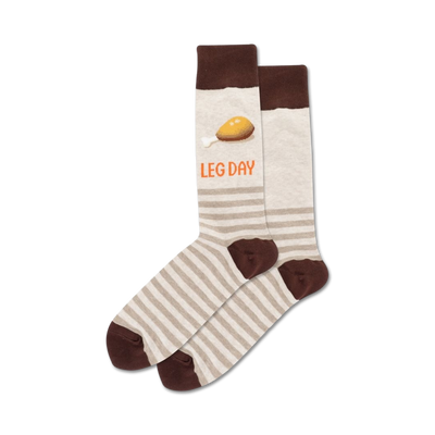 Pair of beige and brown striped crew socks. One sock features a cartoon chicken leg and the text 'LEG DAY'.