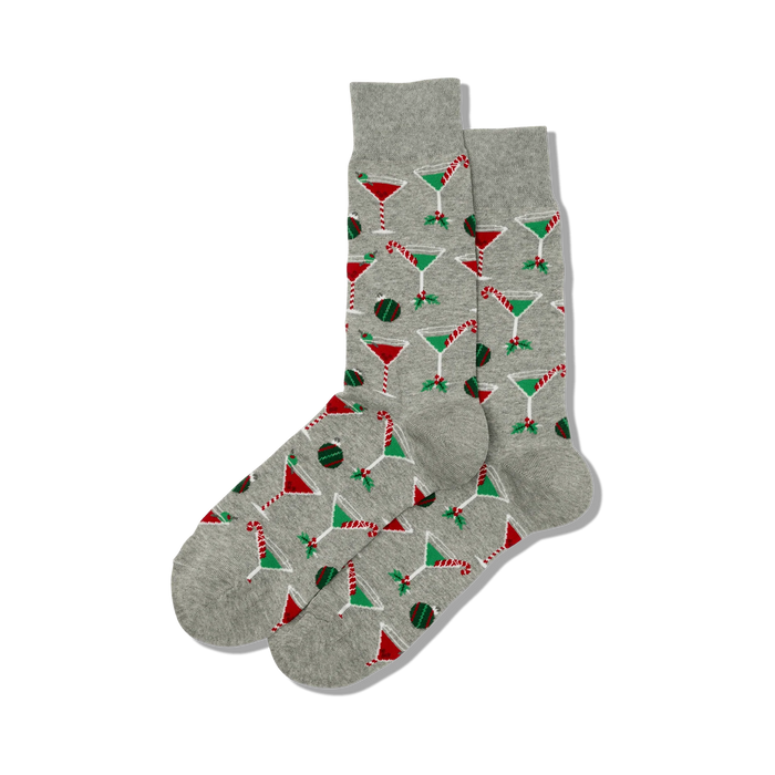 Pair of grey Christmas Cocktails socks shown in a flat lay.