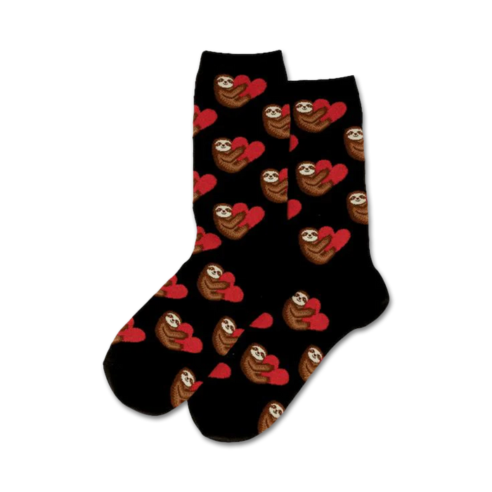 Pair of black crew socks with sloths holding red hearts. Adorable sloth pattern.