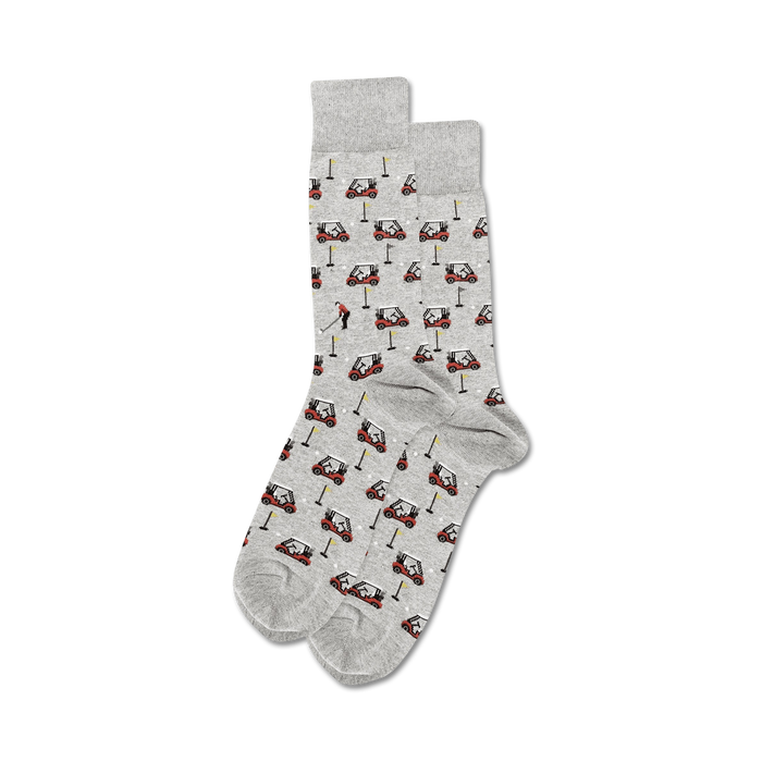 gray men's crew socks with red golf carts, white golf balls, and a golfer in a red shirt.   