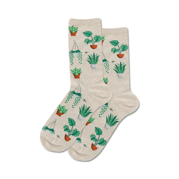 white crew socks with a pattern of potted plants in green, white, and brown. bees are also featured on the socks.    }}