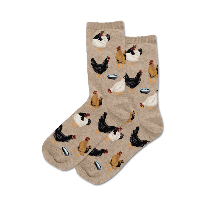 Pair of crew socks, beige and light blue, with a repeating pattern of chickens eating from bowls.