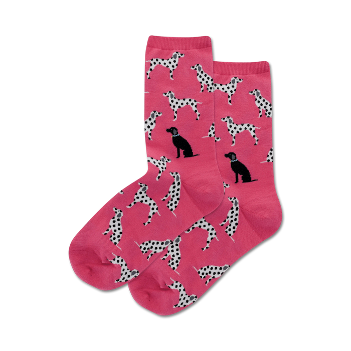 Pair of pink crew socks with a pattern of Dalmatian and black Labrador dogs. The dogs are black and white, and the socks are a bright pink. }}