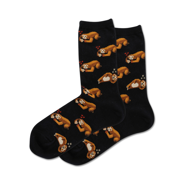 A pair of black crew socks with a repeating pattern of cute sloths and small red hearts. The sloths are brown and appear to be napping. }}