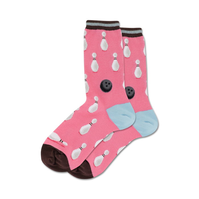 Pair of pink crew socks with white bowling pins and black bowling balls pattern. Brown and light blue cuffs.