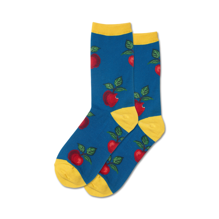 Pair of crew socks in blue with red apples and green leaves. Yellow cuffs. Fun, fruity design. }}