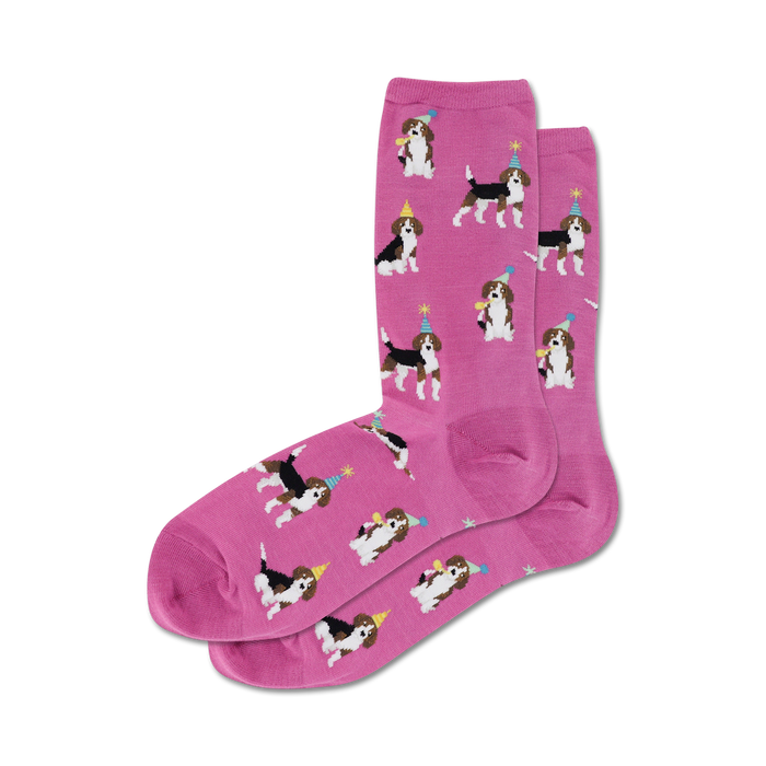 pink novelty crew socks with cartoon beagles wearing party hats and blowing party horns.  