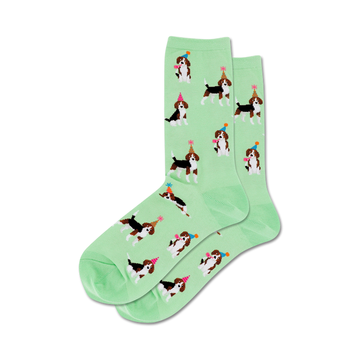mint green crew socks with cartoon beagles wearing party hats and holding noisemakers.  