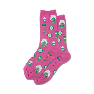 Pair of pink crew socks with a fun spa-themed design:  facial masks, cucumbers, and beauty products.