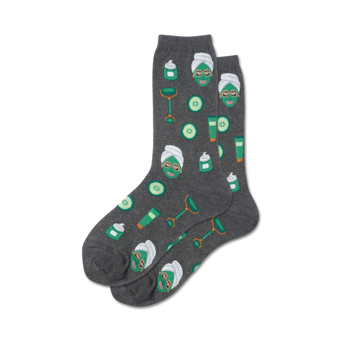 Pair of gray crew socks with the same spa-themed design as the pink pair.