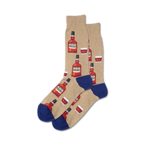mens crew socks in blue with cartoon bourbon bottles and glasses pattern.  