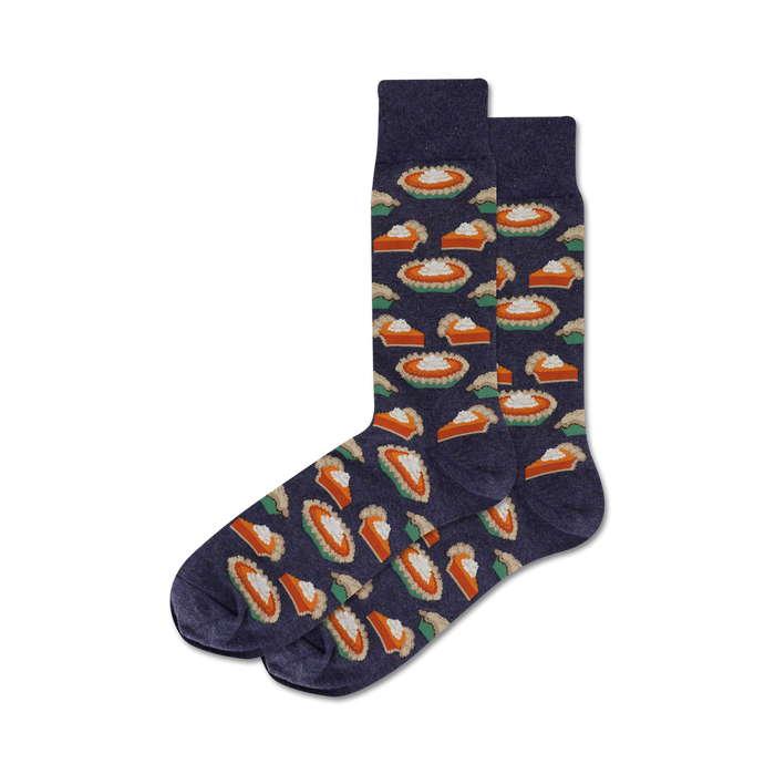 Pair of navy blue crew socks with a pattern of orange pumpkin pie slices and white whipped cream. Festive and fun! }}
