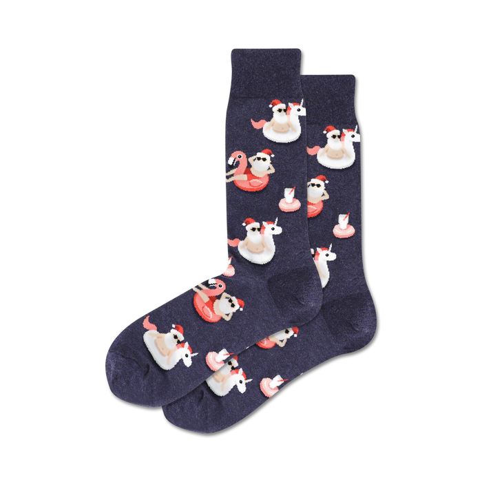 Pair of navy crew socks with a fun Christmas design. Flamingos and unicorns wearing Santa hats float on pink inflatable rings. }}