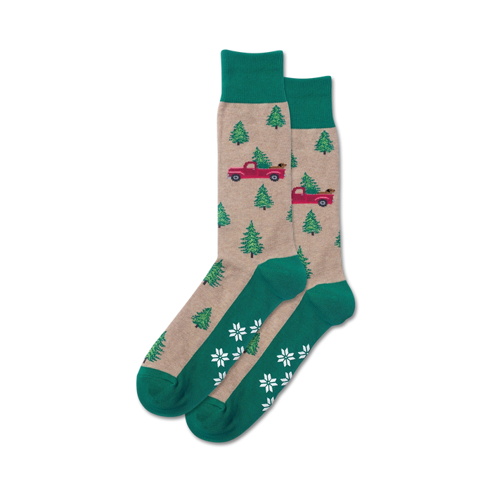tan fuzzy slipper socks with red pickup trucks, green christmas trees, dogs, pine trees, snowflakes, green cuff, and light blue non-skid sole with white dots.  