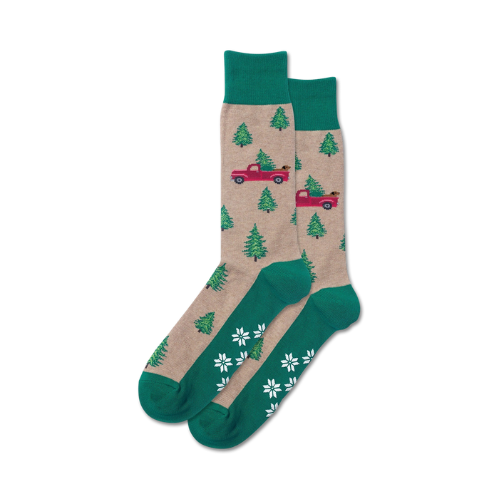 Close-up of a pair of tan and green Holiday Trucks Non-Skid Slipper socks.  The socks feature the same design as the main image, just in different colors.