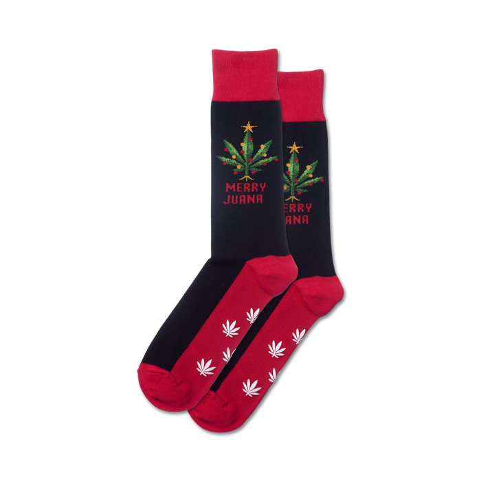 Pair of red and black crew socks. Design features a marijuana Christmas tree and the words Merry Juana.  White marijuana leaves on the red bottom.