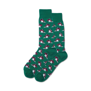 Pair of crew socks, green, featuring a repeating pattern of dogs wearing red scarves.