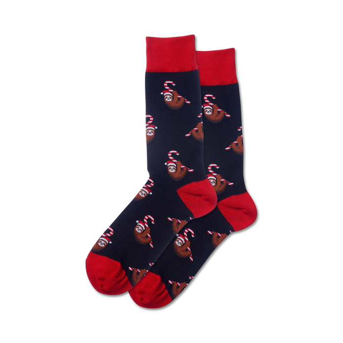 Pair of crew socks; navy blue with red candy canes and sloths wearing Santa hats.  A fun, festive design.