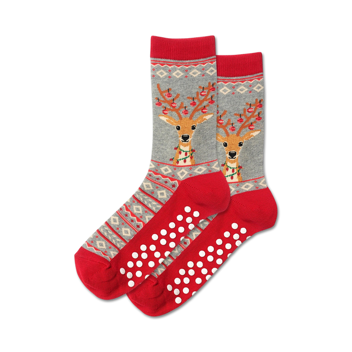 red and gray reindeer with holiday garland slipper sock with non- skid soles and a crew length. excellent for wearing this christmas. 