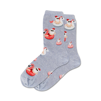 Pair of grey crew socks featuring a fun Christmas design.  Santa in sunglasses is on inflatable flamingos and donuts.