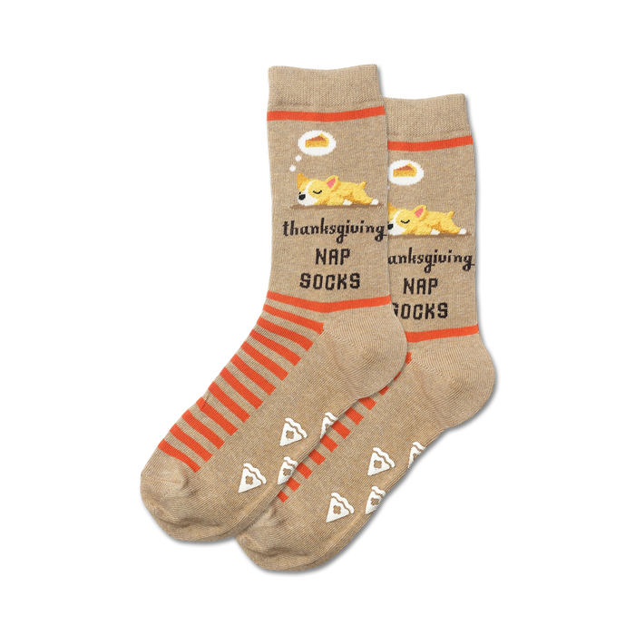 A pair of tan crew socks with orange stripes, adorable sleeping dogs, and pie slices. Non-skid grips on the soles. }}