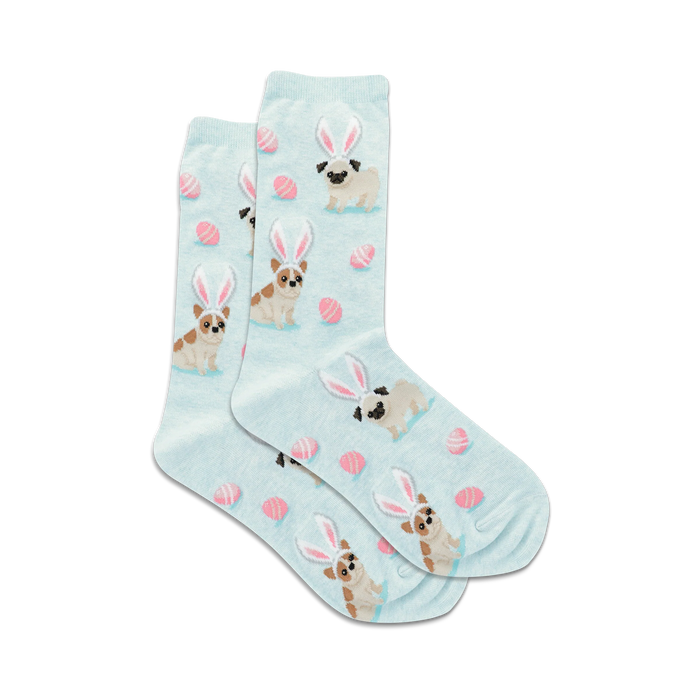socks that are light blue and have a pattern of pugs wearing bunny ears. the ears are pink and white. there are also pink and white easter eggs in the pattern. }}