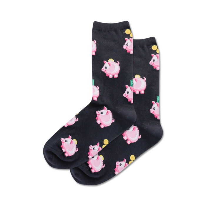 Close-up showing detail of the pink piggy bank pattern on black crew socks.