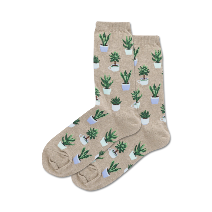 Lifestyle shot showing the beige Potted Succulents socks on a person's feet.