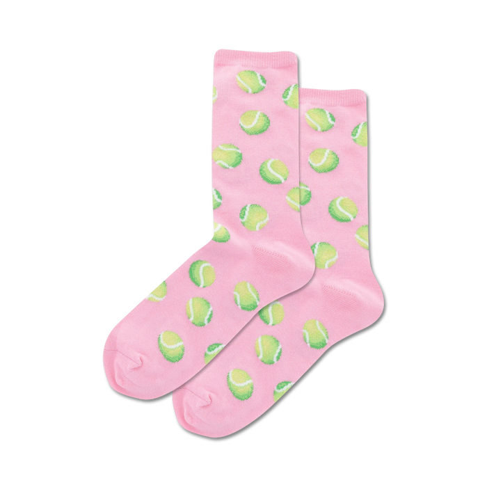 bright pink crew-length women's socks with a pattern of neon green tennis balls.  