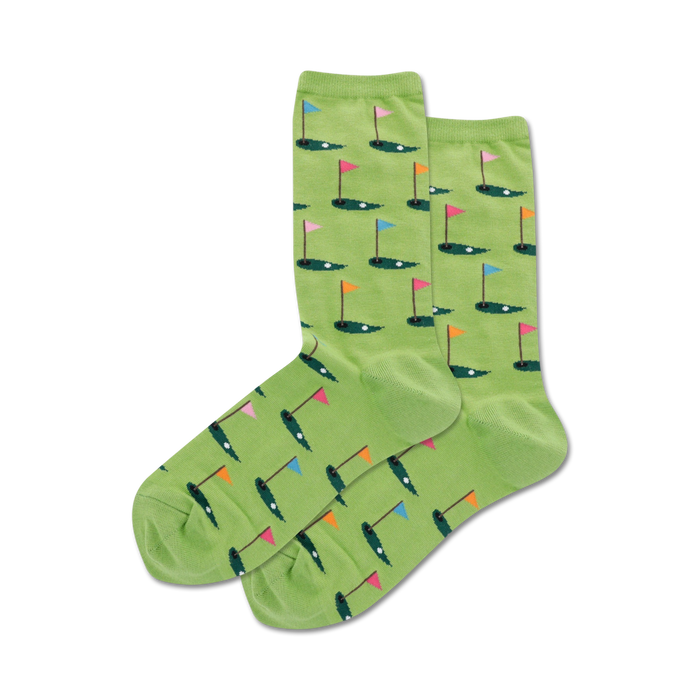 Pair of lime green crew socks with repeating pattern of golf putting greens, flags, and golf balls. Fun, colorful design!