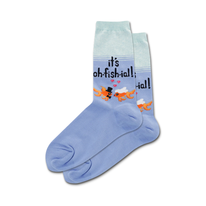 light blue crew socks for women featuring orange fish with black top hats and pink bow ties; says 