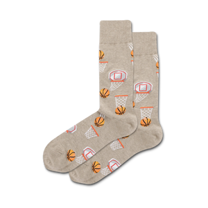 Pair of crew socks in beige and orange, featuring a repeating pattern of basketballs and hoops.