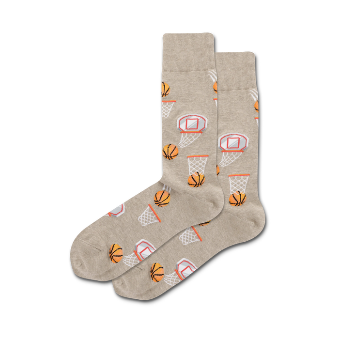 Pair of crew socks in beige and orange, featuring a repeating pattern of basketballs and hoops.