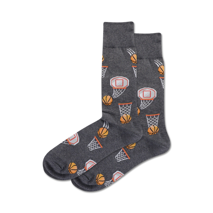 Close-up of a pair of grey crew socks with basketball and hoop pattern.