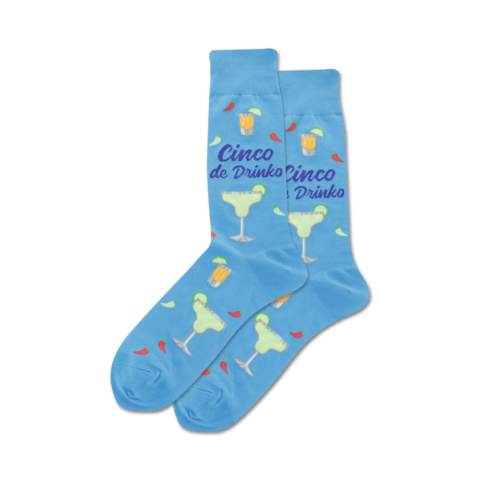 Lifestyle shot showing the blue Cinco de Drinko socks on a person's feet.