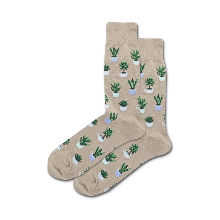 Pair of beige crew socks with a pattern of potted succulents in shades of green and light blue.  }}