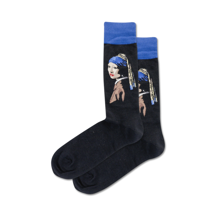 Pair of black crew socks with a vibrant image of Vermeer's 'Girl with a Pearl Earring'. Blue accents and a detailed portrait decorate the socks. }}