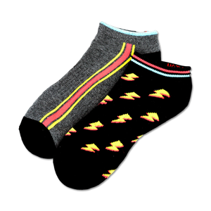 Two pairs of ankle socks. One pair is gray with a pink and yellow stripe, and the other is black with a yellow lightning bolt pattern.