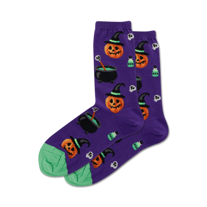 purple crew socks with a halloween pattern. keywords: socks, crew socks, halloween socks, purple socks, spooky socks, funky socks, witch socks, pumpkin socks, cauldron socks, whimsical socks.   