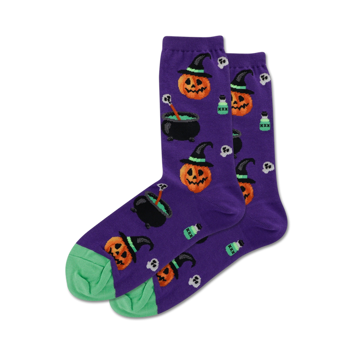 Lifestyle shot showing the purple Witch Pumpkin socks on a person's feet. The socks are styled with a dark colored shoe.