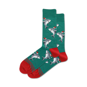 Pair of teal crew socks with a pattern of gray sharks wearing Santa hats. Red and teal stripes at the cuff.