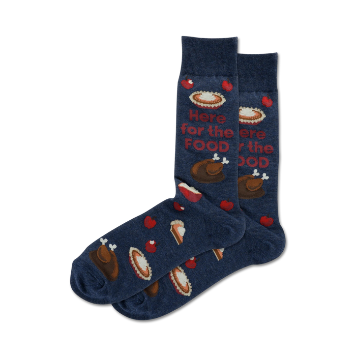 thanksgiving-themed blue crew socks with a pattern of pies, drumsticks, and hearts and the words 'here for the food'.   }}
