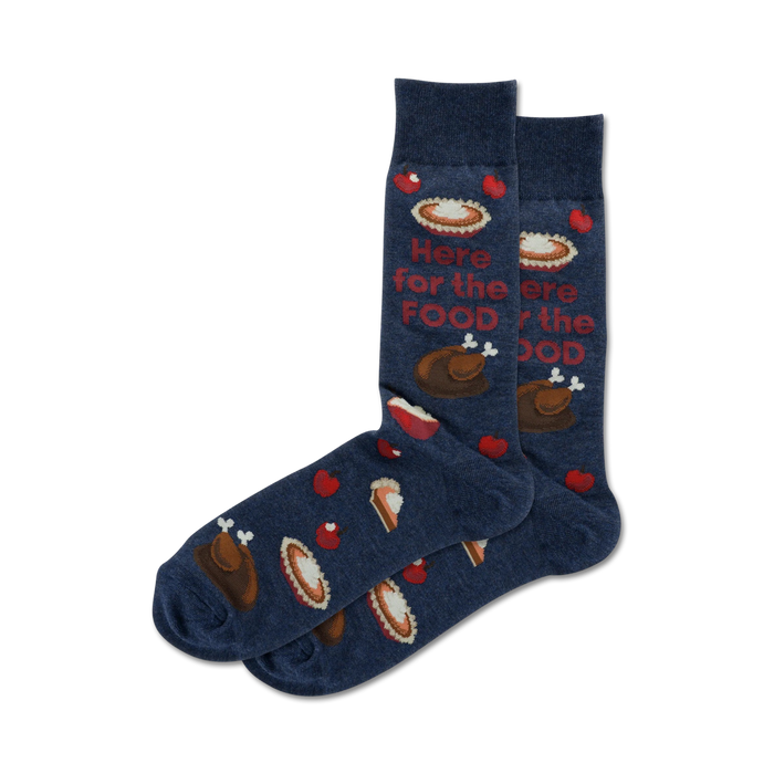Pair of navy blue crew socks with Thanksgiving-themed designs: turkey, pie slices, apples, and the text 'Here for the food'. }}