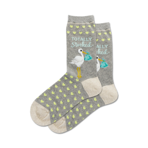 gray crew socks with yellow and green polka dots feature stork carrying blue bundle with white circle and 