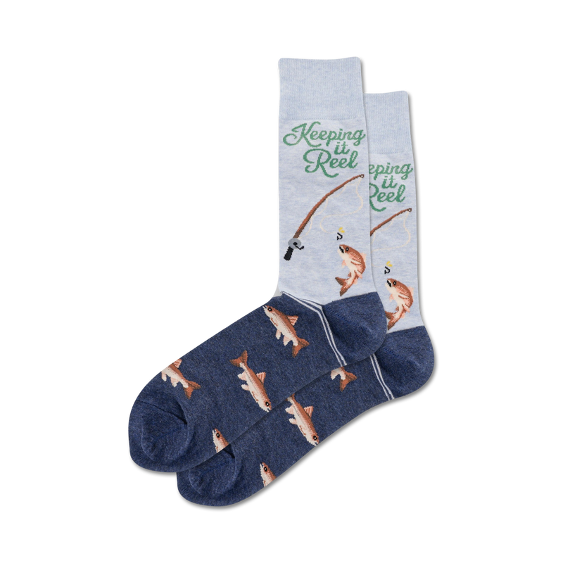 Pair of crew socks, navy blue and light grey, featuring a fishing-themed design with fish illustrations and the text 'Keeping it Reel'.