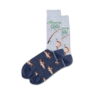 Pair of crew socks, navy blue and light grey, featuring a fishing-themed design with fish illustrations and the text 'Keeping it Reel'.